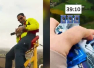 Briton, nakapagtala ng Guinness World Record matapos magbukas ng trading cards habang nakatali sa pakpak ng lumilipad na eroplano