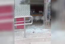 Lalaking gituohang gikabuhi, pwersahang misulod sa usa ka bangko ug namuak og glass door ang martilyo