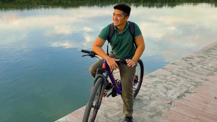 RAFAEL DORILAG BIKING ALONG ILOILO RIVER ESPLANADE