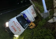 Patrol Car Retrieved Using Excavator After Crashing Off the Road in Barotac Viejo