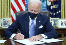 ‘Ayuda na ‘stimulus package’ ni Biden kasama rin ang mga Pinoy sa US – PH envoy Biden signing mask White House