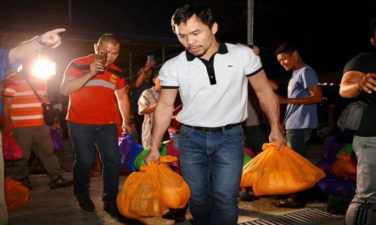 Pacquiao, nagkari a tumulong kadagiti nakurapay a Pilipino